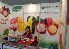 Ms Stacy Hemmasart of Kodanmal Group Co., Ltd. is receiving a visitor at the booth. The company supplies a variety of fresh fruits from Thailand.